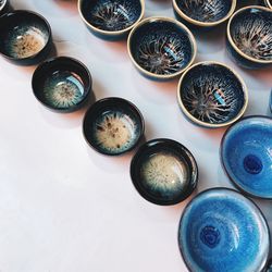 High angle view of bowls arranged on table