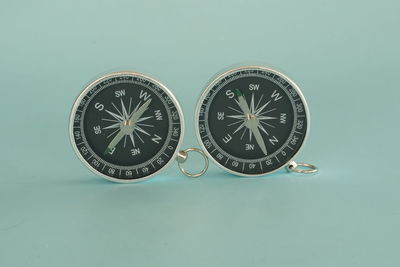 Close-up of clock against blue background