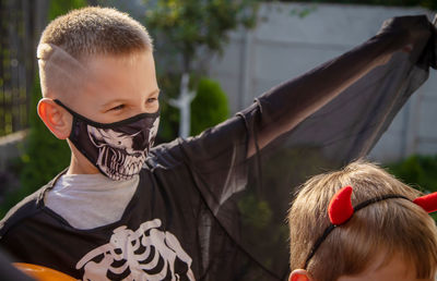 Boy wearing halloween costume