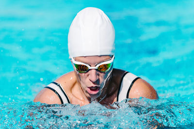 Woman swimming in pool