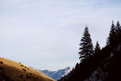 Scenic view of mountains against sky during winter