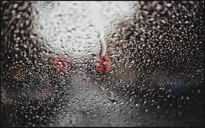 Close-up of water drops on glass