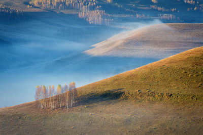 Scenic view of land against sky