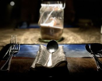 Close-up of wine glasses on table at restaurant