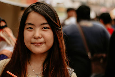 Portrait of a smiling young woman