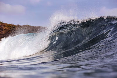 Close up shoot of a wave breaking