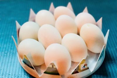 Close-up of eggs in container on table