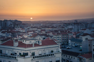 High angle view of townscape against sky during sunset