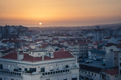 High angle view of townscape against sky during sunset