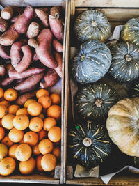 High angle view of pumpkins for sale at market stall