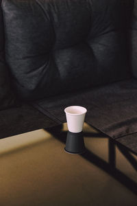 High angle view of coffee cup on table