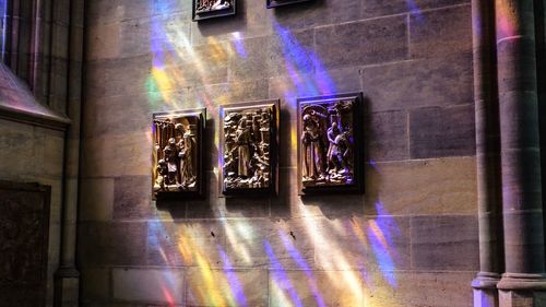 Low angle view of illuminated window in building