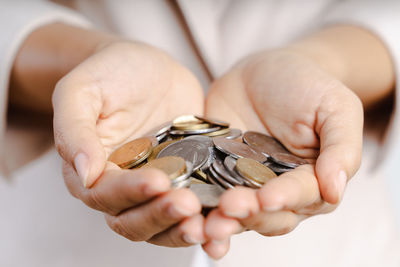 Close-up of hand holding shell