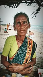 Woman standing on beach