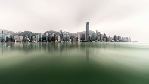 Buildings in city against sky