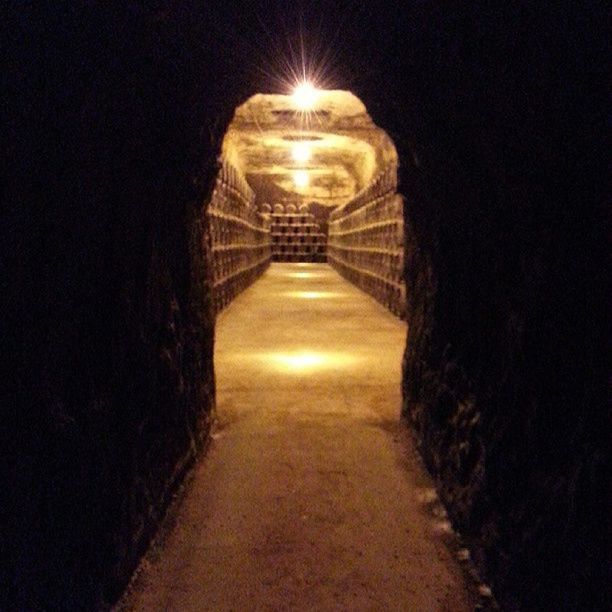 illuminated, the way forward, night, lighting equipment, diminishing perspective, indoors, tunnel, vanishing point, light - natural phenomenon, built structure, architecture, electric light, empty, arch, dark, street light, lit, no people, glowing, corridor