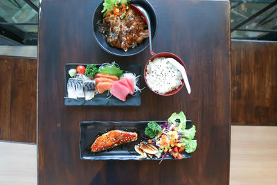 High angle view of sushi served on table