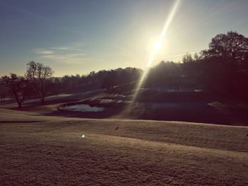 Scenic view of landscape against sky during sunset