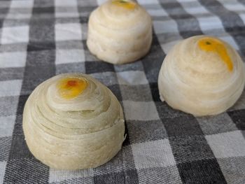 High angle view of bread on cutting board