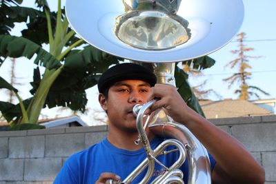 Man playing trumpet during event