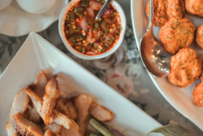 High angle view of serving food in plate on table