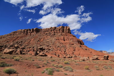 Scenic view of mountain against blue sky