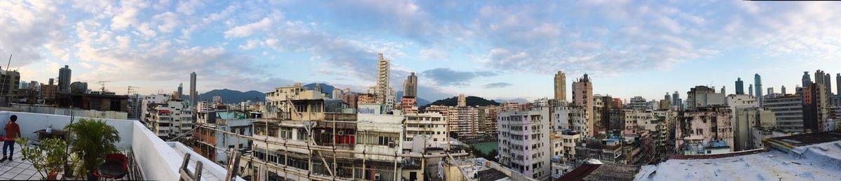 Panoramic view of cityscape against sky