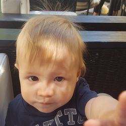 Close-up portrait of cute baby at home