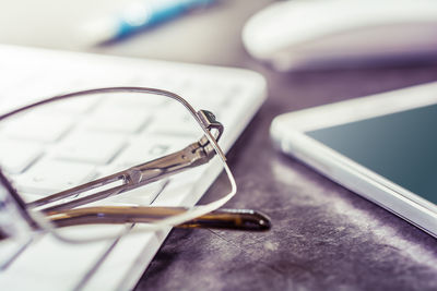 Close-up of smart phone on table