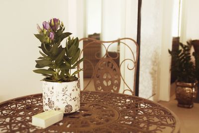 Close-up of vase on table at home