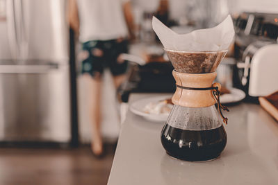 Close-up of coffee served on table at home