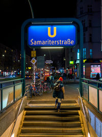 People walking on railroad station