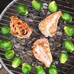 High angle view of meat on barbecue grill