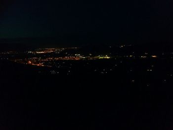 Illuminated cityscape at night