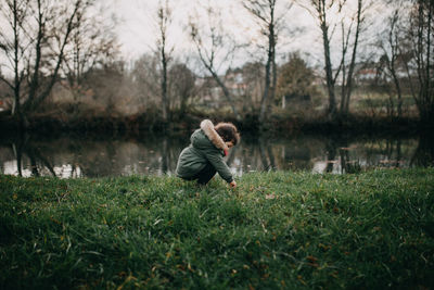 Side view of man in lake