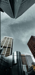 Low angle view of modern buildings against sky