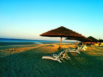 Scenic view of beach against clear sky