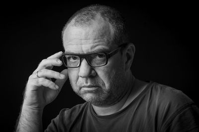 Sad adult male close-up. black and white portrait