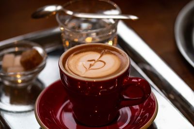 Close-up of coffee served on table