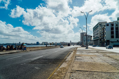 Road in city against sky