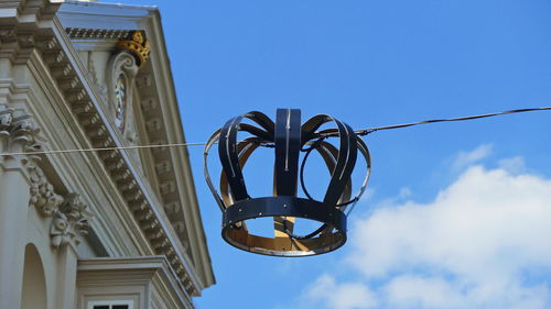 Low angle view of street light against sky