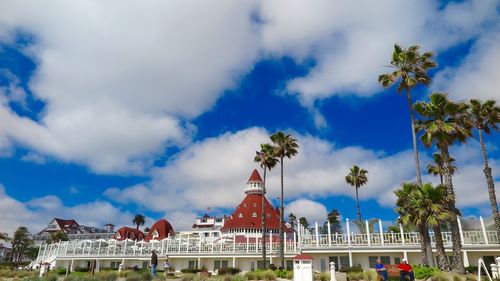 Low angle view of built structure against cloudy sky