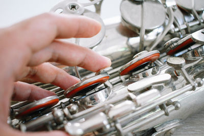 Cropped image of hand holding equipment