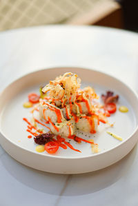 Close-up of food in plate on table