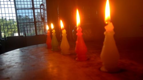 Close-up of illuminated candles