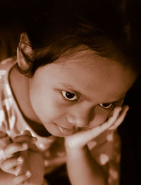 High angle view of girl looking away at home