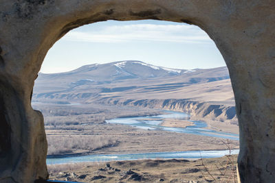 Landscape seen through arch