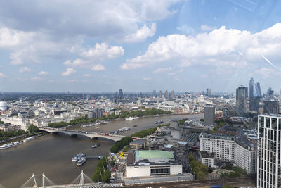 High angle view of buildings in city against sky