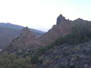 Scenic view of mountains against clear sky