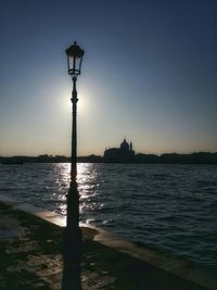 Scenic view of sea against sky at sunset